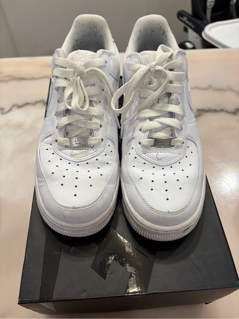 Supreme White Low-Top Leather Sneakers